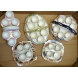 Five ceramic egg cruets including Imari and relief moulded examples, tallest 13cm