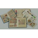 An album of 1937 Coronation omnibus stamps, mint and used, together with two small stockbooks and