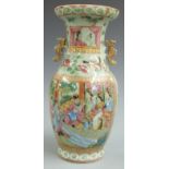 A 19th/ 20thC Chinese famille rose vase with figural scene and gilt twin handles, 23cm tall