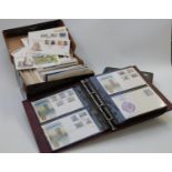 A large quantity of GB and Channel Island first day covers, loose and in albums