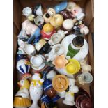 Approximately 30 novelty egg cups including figural, retro, kitsch, Japanese etc