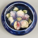 Moorcroft pin dish decorated in the Clematis pattern, diameter 11.5cm