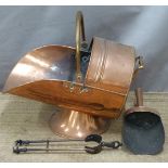 A copper coal scuttle and accessories