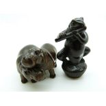 Japanese dark wood netsuke depicting a frog playing a musical instrument together with a Japanese