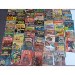 Sixty-one Dell comics including Sea Hunt, Daniel Boone, Space Cadet, Jacky's Diary, Sherlock Holmes,