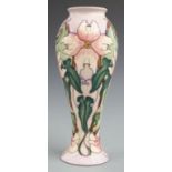 Moorcroft pedestal vase decorated with pink flowers, dated 2001 to base, H27cm