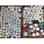 Approximately 140 novelty egg cups, mainly crested, and a small quantity of transport related