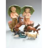Pair of retro chalk umbrella figures, Beswick cow and German horse figures