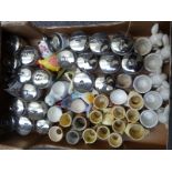 Approximately 33 Royal Worcester egg coddlers and further novelty egg cups