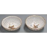 A pair of 19th/20thC continental pierced pedestal baskets with bird decoration, diameter 16cm H5cm