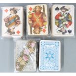 Three packs of Bernhard Dondorf playing cards two having Egyptian/Oriental scenic aces and two