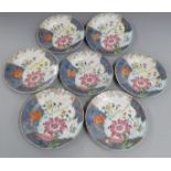 Seven 18th/ 19thC Chinese tobacco leaf pattern cabinet plates painted with large, colourful leaves