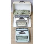 1950s retro / mid century Hermes Baby portable typewriter and an Olympic de Luxe typewriter in