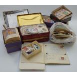 A quantity of loose stamps in boxes and packets, and sundry items