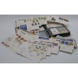 A collection of first day covers and presentation packs
