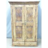 A carved Eastern hardwood cupboard, by repute originally purchased from Liberty, London, W103 x