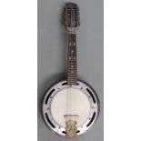 A c1930s 8 string mandolin banjo, with case