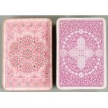 Two packs of De La Rue & Co. London playing cards, both with three pence duty aces, double ended