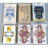 Six packs of German playing cards including Straslund and Eduard Buttner