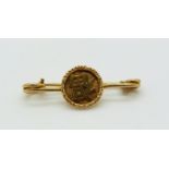 An 18ct gold Chinese brooch with character decoration, maker WS (Woshing)