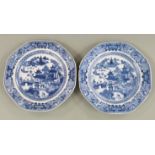 A pair of 19thC Chinese blue and white octagonal export plates decorated with landscapes and