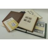 Three stamp albums of mint GB stamps, presentation packs and first day covers, face value at
