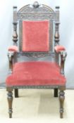 Victorian upholstered carved oak hall chair with figural armrests