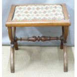 Ornate stool with embroidery seat raised on cross stretchers together with cross stitch embroidery