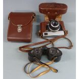 A pair of Carl Zeiss Jenoptem 8x30w binoculars together with a Werra camera having Carl Zeiss Tessar
