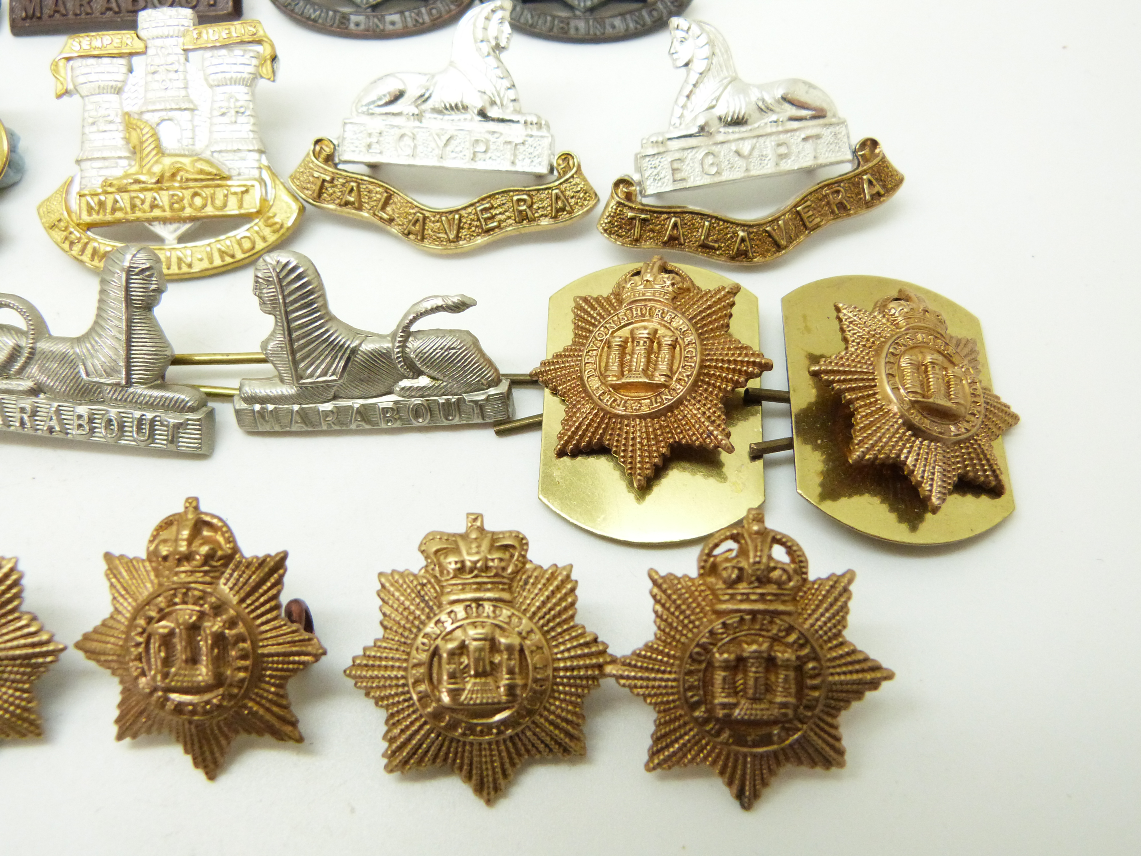 Twenty Four British Army Devonshire and Dorsetshire Regiment metal collar badges in eleven pairs - Image 4 of 8