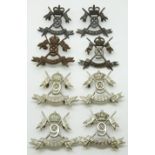 Eight British Army 9th Lancers metal collar badges in three pairs including an OSD example plus