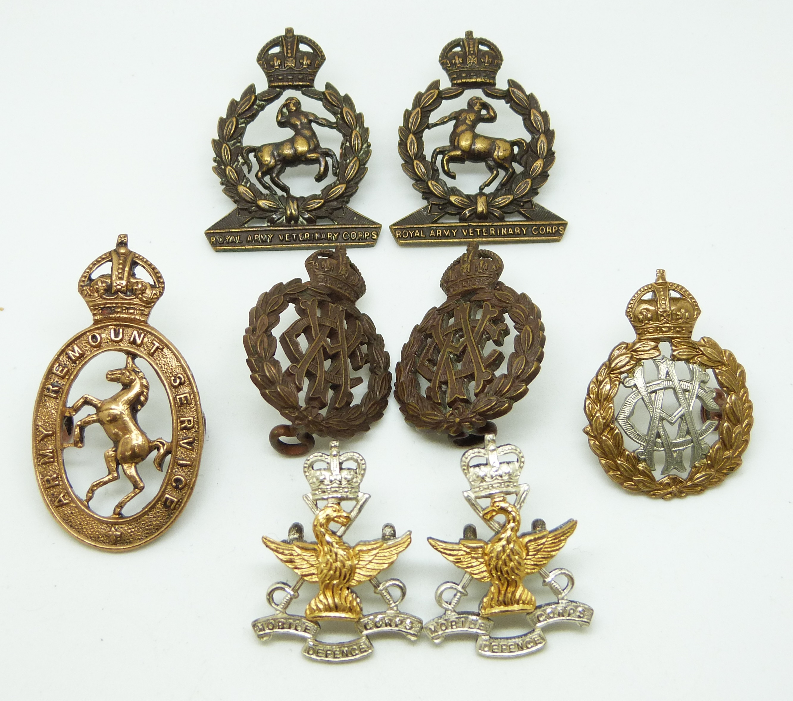 British Army Veterinary Corps pre and post 1918 metal collar badges in two pairs plus one other,