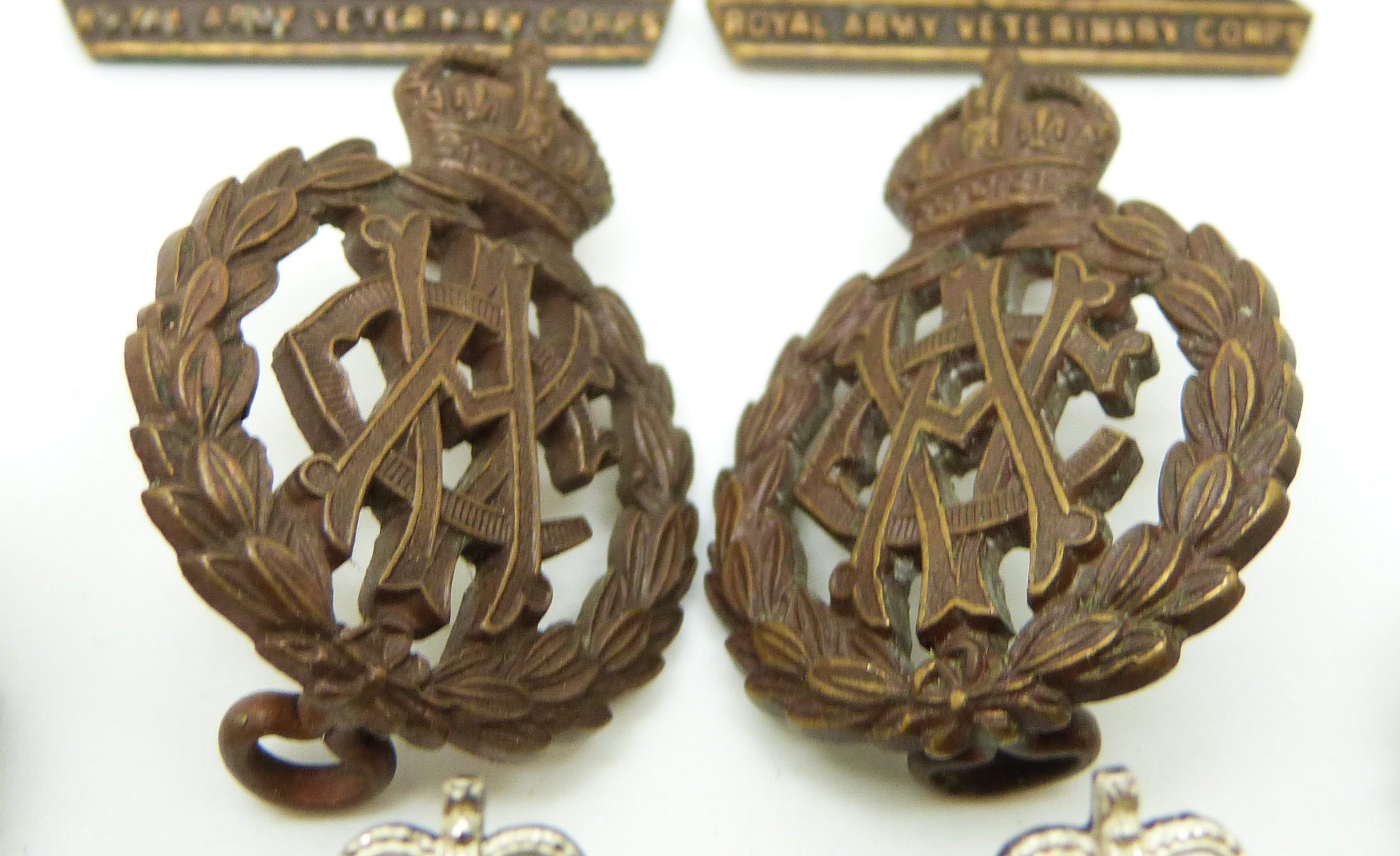British Army Veterinary Corps pre and post 1918 metal collar badges in two pairs plus one other, - Image 3 of 5