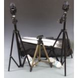 Two photography studio lights with umbrella style reflectors and tripods, in carry bag