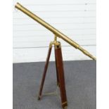 Brass telescope on wooden extending tripod, length of telescope 100cm