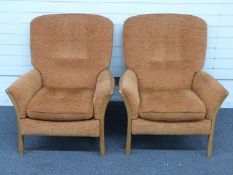 Ercol pair of light elm recliner armchairs, H87cm