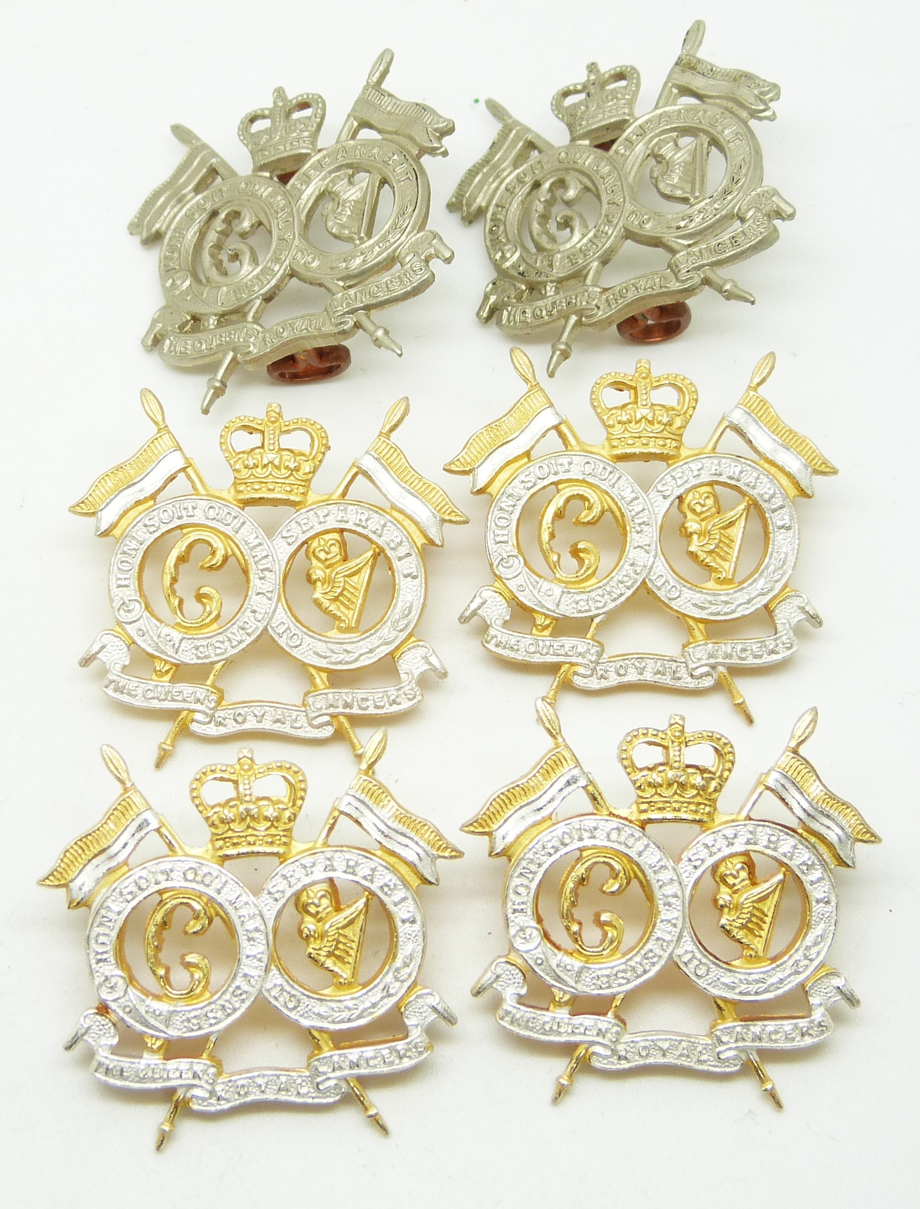 Six British Army 16th/5th Lancers metal collar badges in three pairs, post 1954 Queen Elizabeth