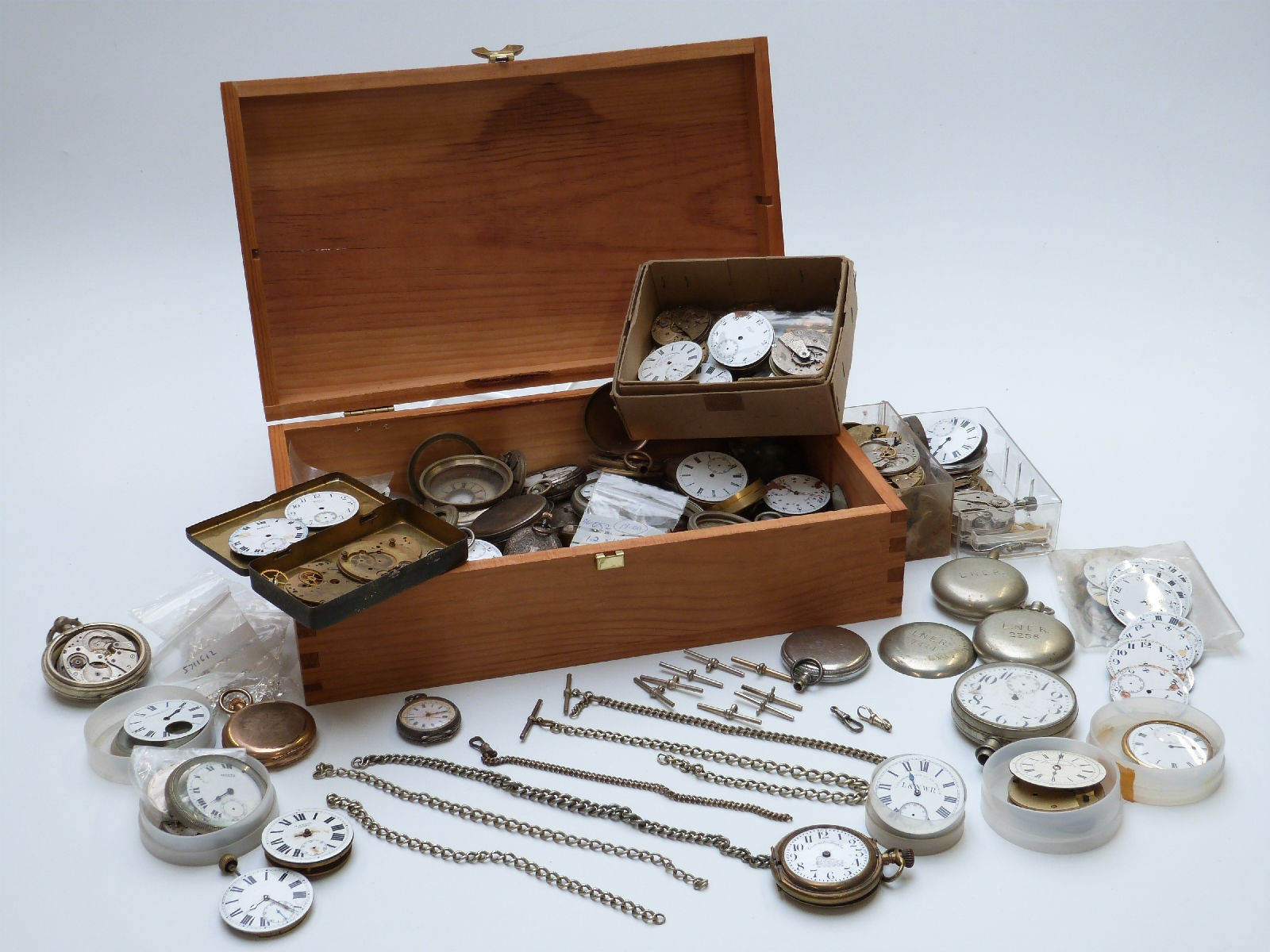 A large quantity of incomplete pocket watches, dials, movements and cases etc, includes stamped L.