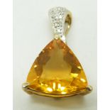 A 9ct gold pendant set with a trilliant cut fire opal and diamonds, 2.8g,