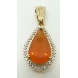 A 9ct gold pendant set with a pear cut Buriti fire opal and diamonds, 5.9g