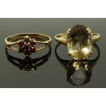 Two 9ct gold rings, one set with quartz and the other garnets, sizes M & N, 3.84