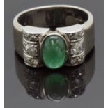Art Deco 18ct white gold ring set with an emerald cabochon and six old cut diamonds, size J/K, 9.62g