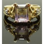 A 9ct gold ring set with a quartz and diamonds, size N, 3.62g