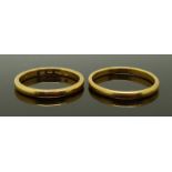 Two 22ct gold wedding bands/ rings, sizes L/M & N, 5.47g