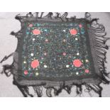 A 19th/20thC Chinese black shawl with embroidered chrysanthemum decoration and long fringe, 210 x