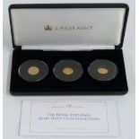 Three Jubilee Mint 'miniature' gold crown coins commemorating the Queen's 90th Birthday, cased