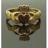 A 9ct gold Claddagh ring, size X/Y, 3.50g