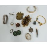 A collection of jewellery including silver bangle, pressed amber brooch, paste bracelet, silver fob,