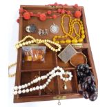 A collection of jewellery including amber, silver pendant and brooch, ivory beads, pearls, beaded