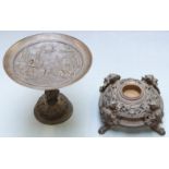 Bronze tazza decorated with Roman scenes, height 14cm and a cast metal inkwell
